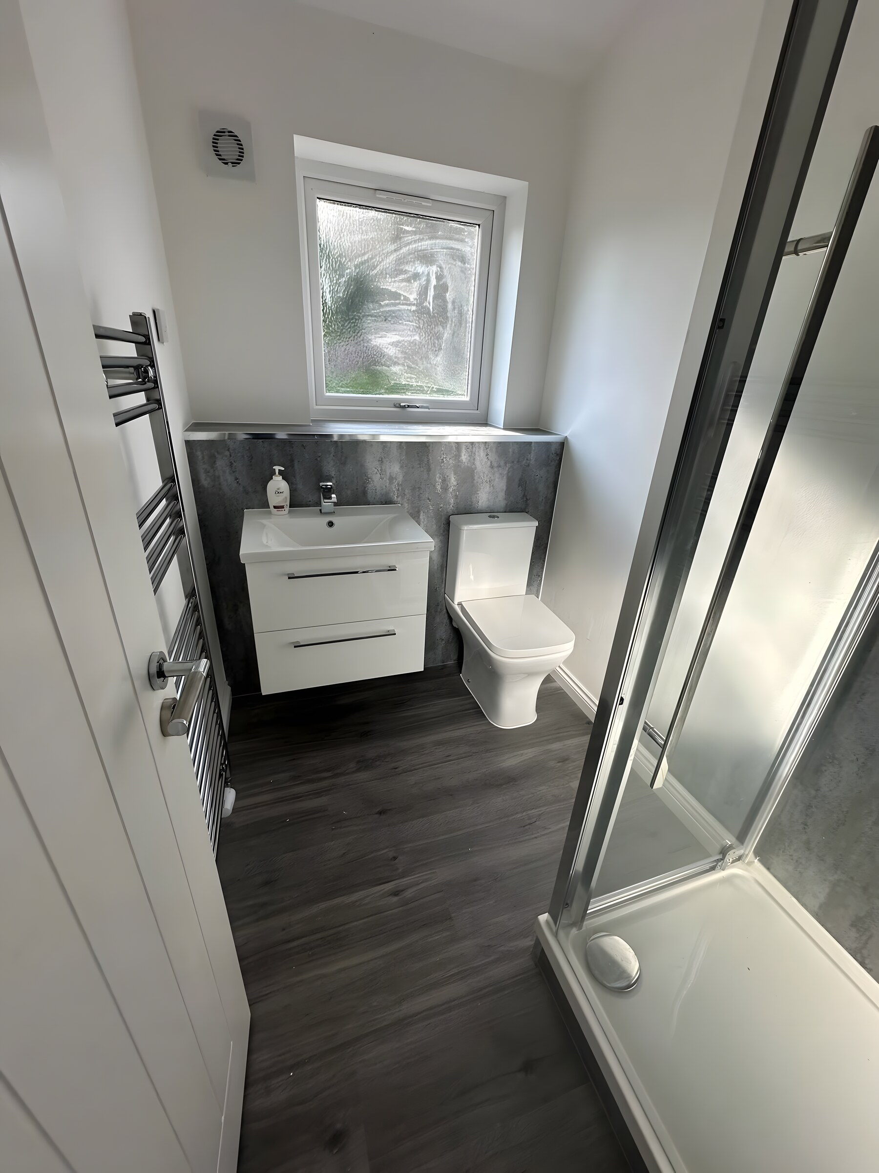 A shower room fitted as part of an extension