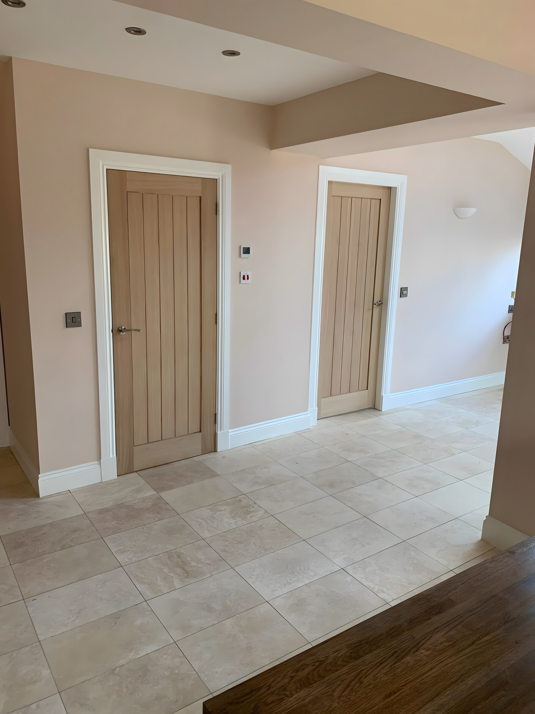 Oak ledged doors in a finished hall