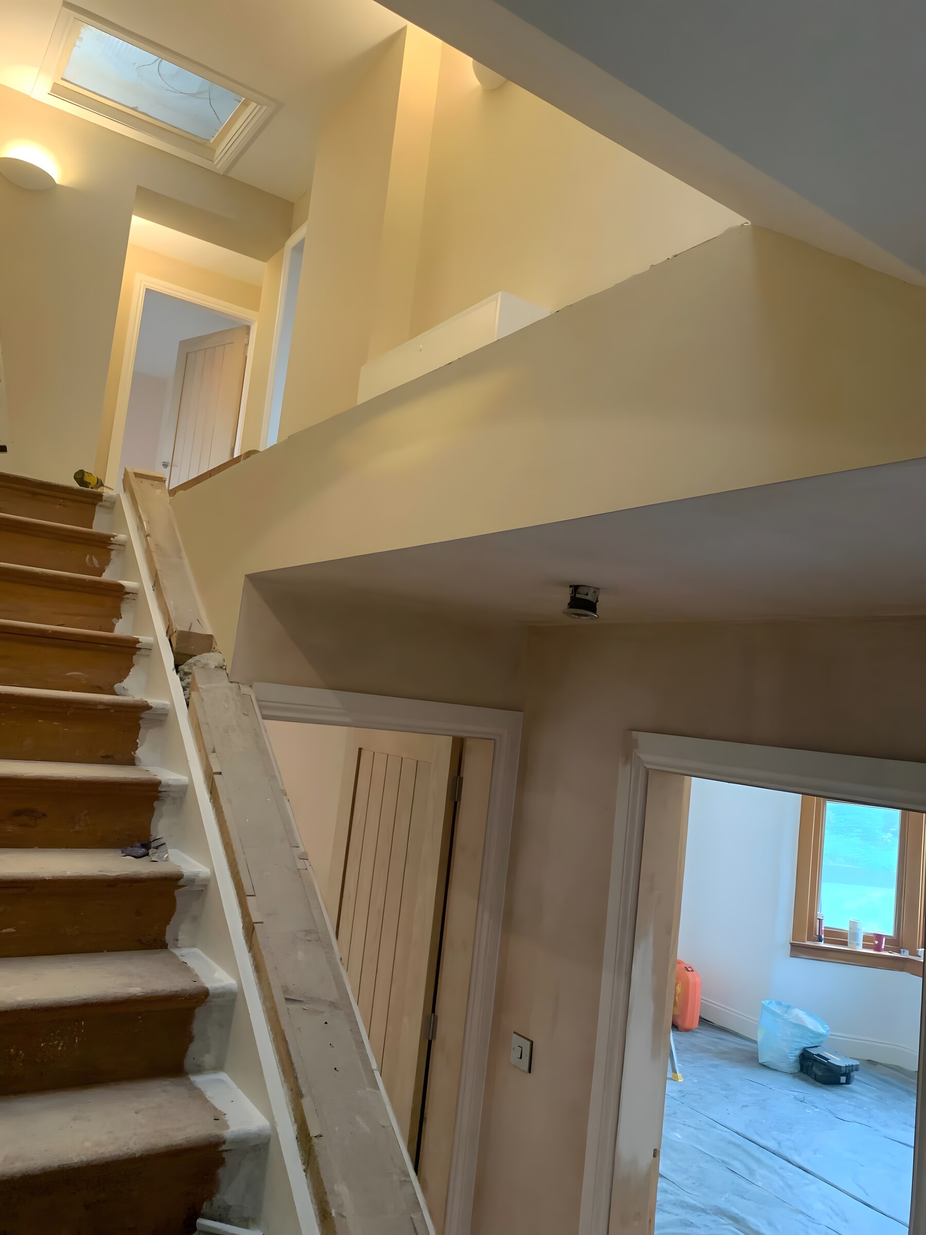 Looking up the stair from the hall, before the balustrade went on